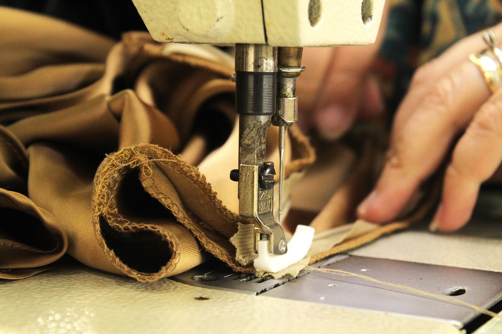 Heavy fabric being repaired with a sewing machine